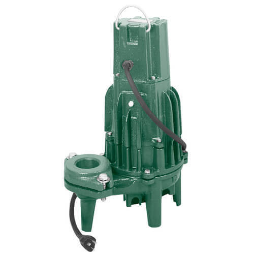 Green cast iron submersible pump with handle, control lever, and power cord attached to base.