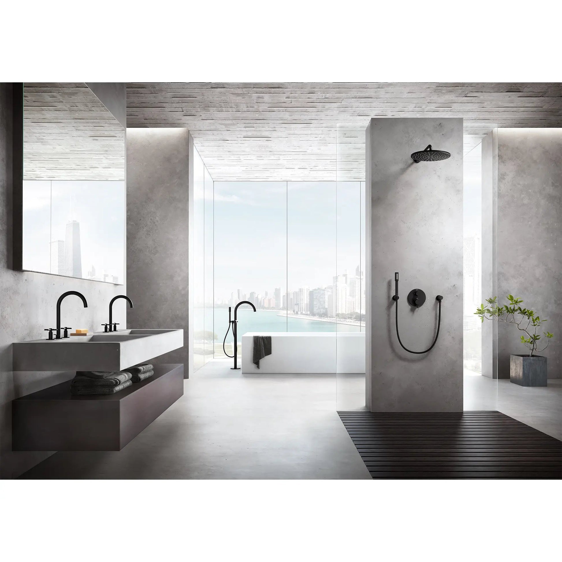 Matte black freestanding tub faucet with single handle and detachable hand shower in modern bathroom setting.
