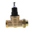 Brass pressure reducing valve with black handle and threaded ports for plumbing installation.