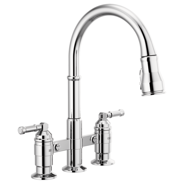 Chrome bridge kitchen faucet with two handles and pull-down spray head.