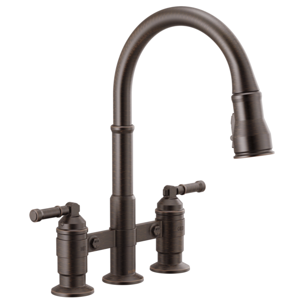 Bronze two-handle pull-down bridge kitchen faucet with curved spout and lever controls.