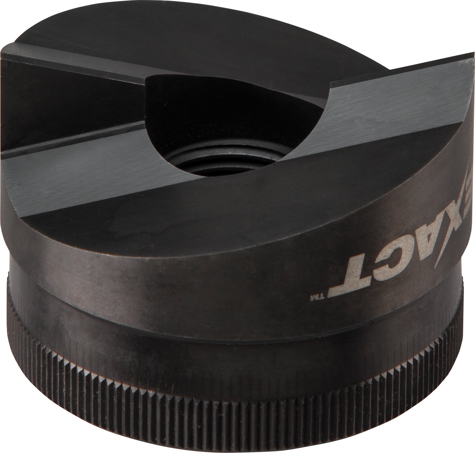 Black Milwaukee EXACT 4 inch punch tool with cylindrical body, central circular opening, and ribbed base.