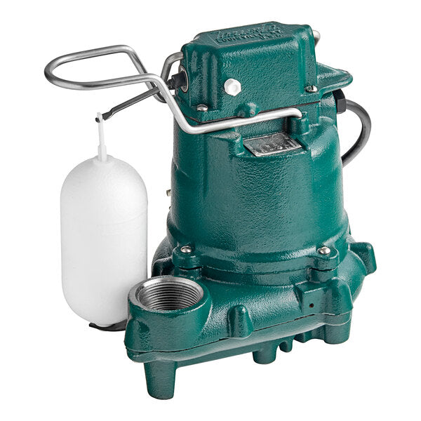 Teal cast iron submersible sump pump with white float switch and outlet port, mounted on legs.