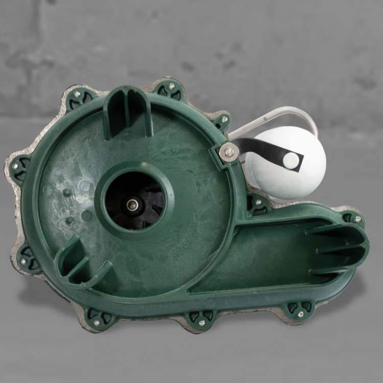 Green cast iron sewage pump housing with central impeller, mounting holes, discharge outlet, and white piggyback float switch