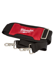Red and black nylon carrying strap with Milwaukee logo, padded shoulder section, and metal snap hooks on both ends.