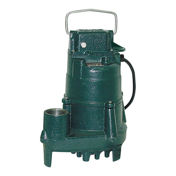 Green cast iron submersible pump with metal handle, outlet port, and power cord.