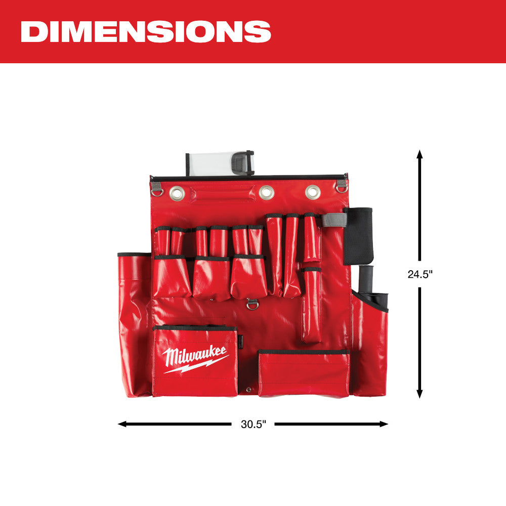 Red canvas tool apron with multiple pockets, metal D-rings, and black straps, measuring 30.5 inches wide by 24.5 inches tall.
