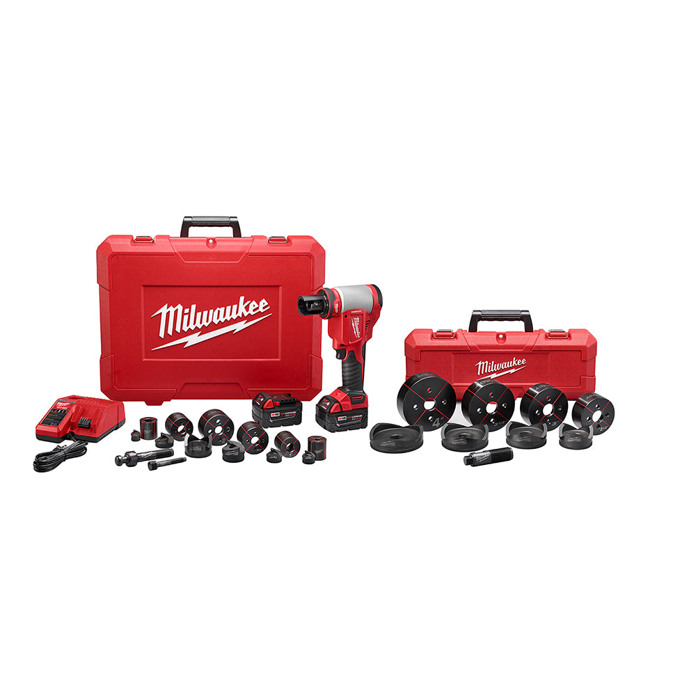 Milwaukee M18 FORCE LOGIC knockout tool kit with red carrying cases, batteries, charger, and multiple knockout dies.