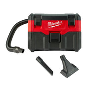 Red and black wet/dry vacuum with attached hose and two black accessory attachments.