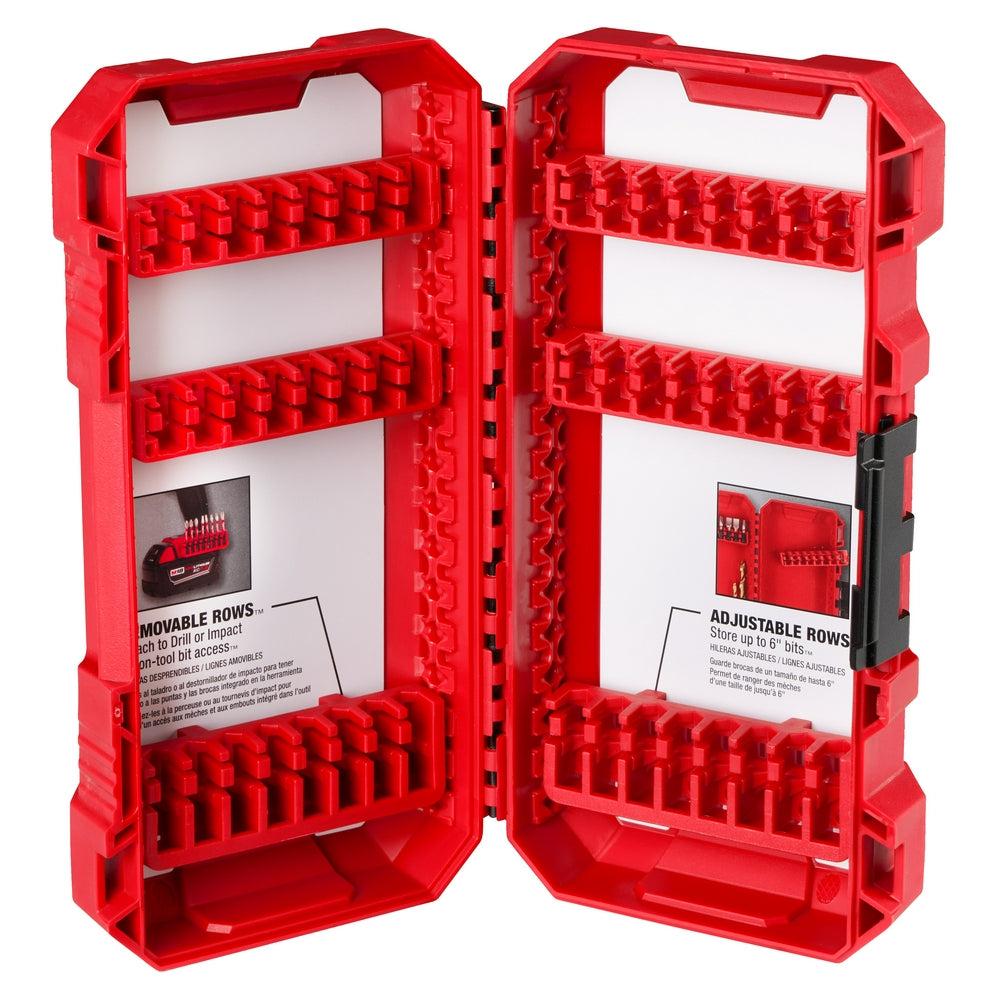 Red plastic case with hinged doors open, showing multiple rows of customizable compartments and bit storage areas.