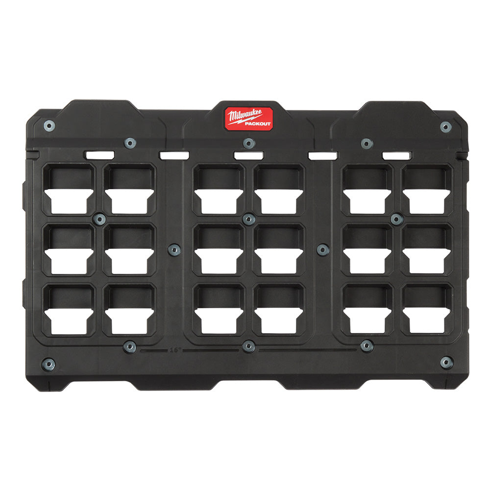 Black plastic wall plate with 12 socket compartments, Milwaukee PACKOUT branding, and blue mounting holes.
