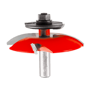 Freud router bit with red cutting edges, metal shank, and hex collar featuring backcutters for raised panel routing.