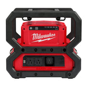 Milwaukee M18 CARRY-ON power supply with red housing, black frame, digital display, and multiple outlet ports.
