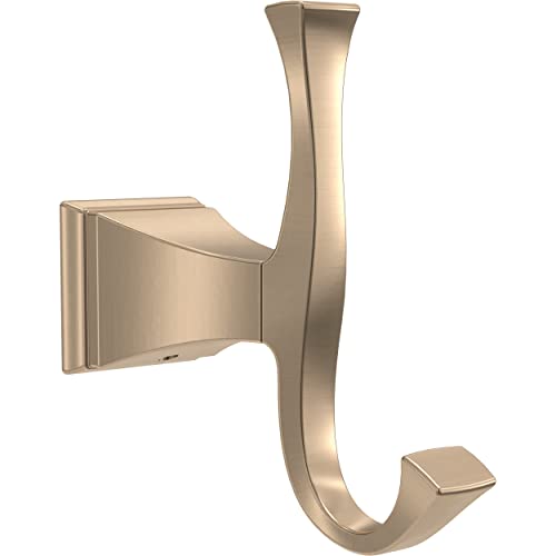 Champagne bronze double robe hook with curved arms and rectangular wall mount plate.
