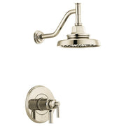 Polished nickel thermostatic shower trim with curved arm, round showerhead, and circular valve trim plate.