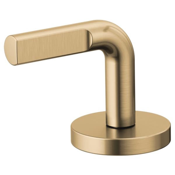 Brushed gold faucet handle with notch lever design and circular base mount.
