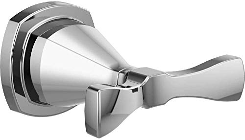 Chrome double robe hook with curved handles mounted on circular wall plate.