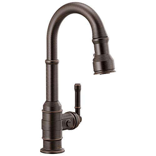 Brushed bronze single-handle pull-down kitchen faucet with high arched spout and spray head.