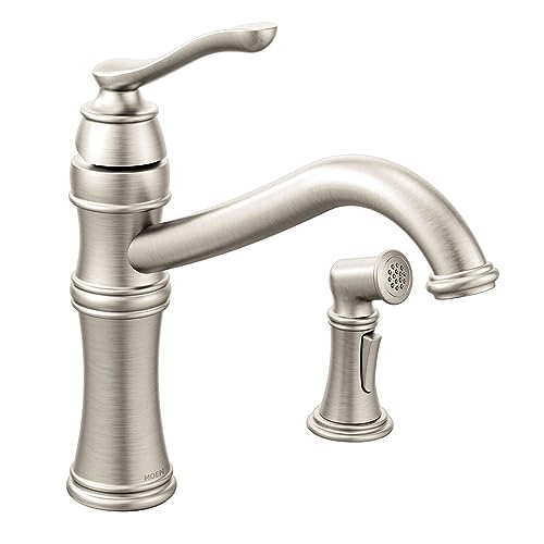 Stainless steel kitchen faucet with high arc spout, single handle, and detachable side spray.