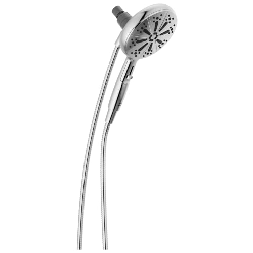 Chrome hand shower with curved handle and multiple spray jets, connected to flexible hose.