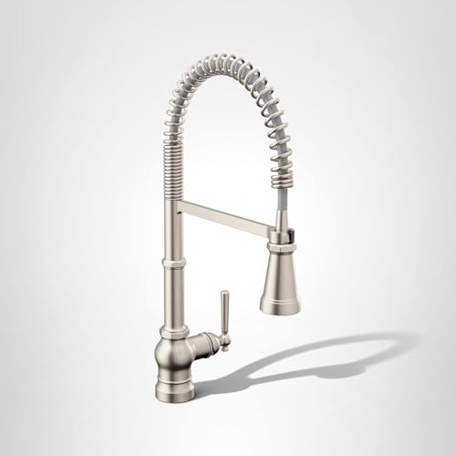 Stainless steel kitchen faucet with coiled spring pulldown spout, single handle lever, and spot resist finish.