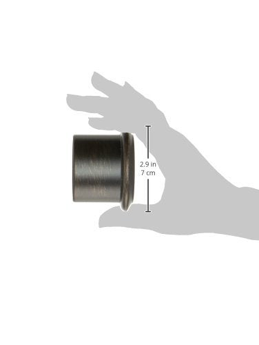 Cylindrical Venetian bronze trim sleeve with dimension measurements shown in hand for scale.