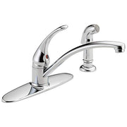 Chrome kitchen faucet with single lever handle, curved spout, and separate spray head on base deck.