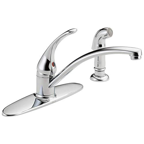 Chrome kitchen faucet with single lever handle, curved spout, and separate spray head on base deck.