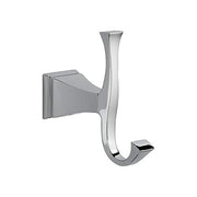 Chrome double robe hook with curved hooks extending downward from rectangular wall mount.