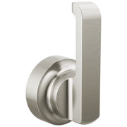 Stainless steel floor-mount tub filler handle with curved lever design and brushed metal finish.