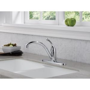 Chrome single handle kitchen faucet with curved spout installed on white countertop.