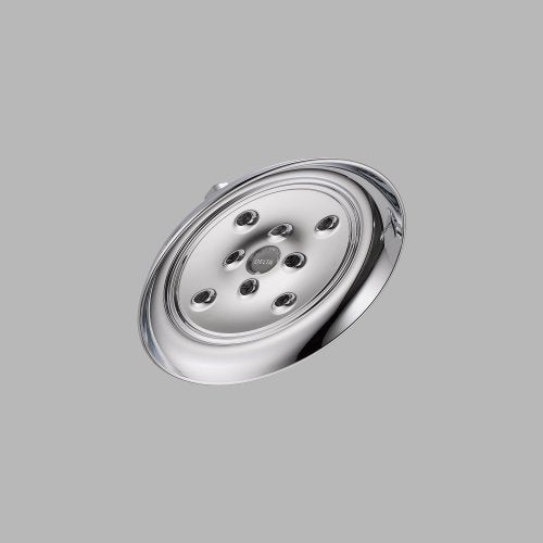 Chrome raincan shower head with circular face featuring multiple spray holes arranged around center nozzle.
