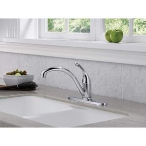 Chrome single-handle kitchen faucet with curved spout and lever control mounted on countertop sink.