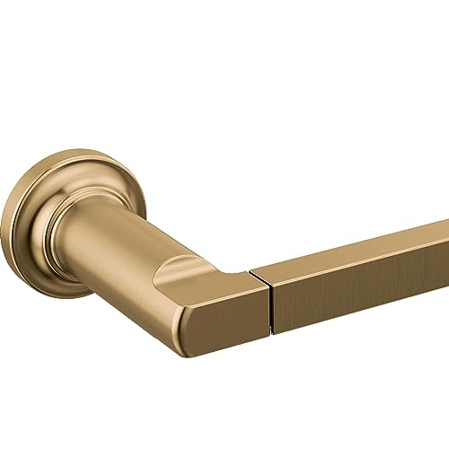 Champagne bronze wall-mounted tissue holder with cylindrical bar and square mounting plate.