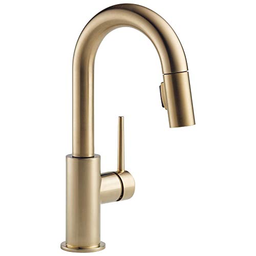 Champagne bronze single-handle kitchen faucet with pull-down spout and curved neck design.