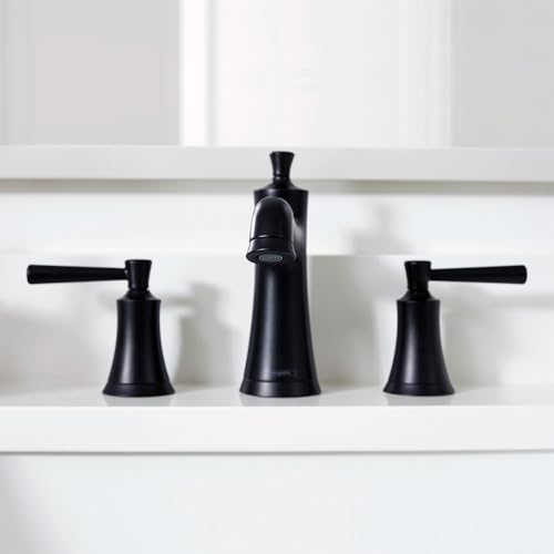 Polished nickel widespread bathroom faucet with tall center spout, two side handles, and pop-up drain mounted on white sink.