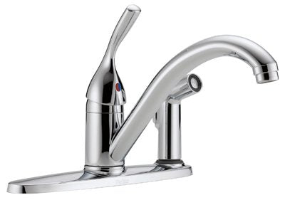 Chrome single-handle kitchen faucet with curved spout and attached side spray on deck plate.