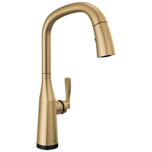 Champagne bronze single-handle kitchen faucet with high curved spout and pull-down spray head.