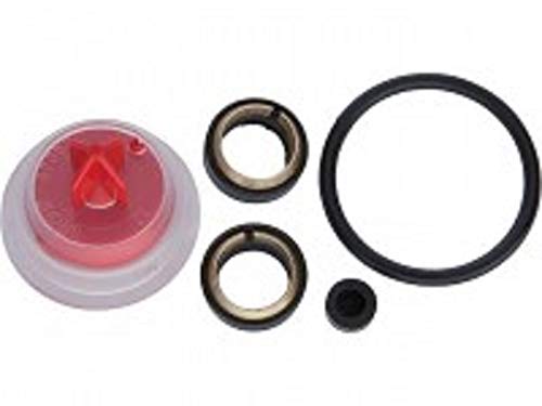 Grohe repair seal set containing pink cartridge, metal washers, black rubber rings, and small black component.