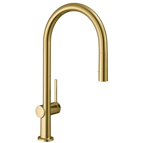 Brushed gold kitchen faucet with high arcing spout and pull-down spray head on cylindrical base.