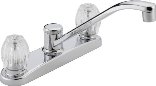 Chrome two-handle kitchen faucet with clear knobs and curved spout on white base plate.