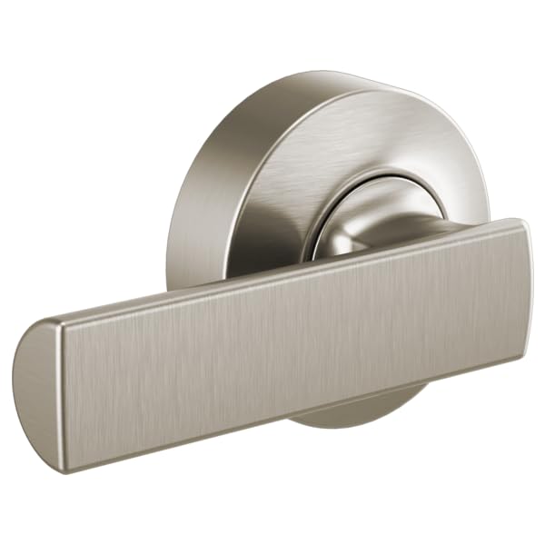 Brushed nickel toilet flush lever with rectangular handle and circular mounting plate.