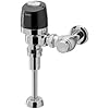 Polished chrome wall-mounted toilet flush valve with black lever handle.