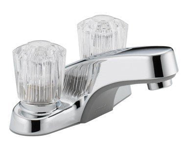 Chrome bathroom faucet with two clear ribbed handles and curved spout on rectangular base.