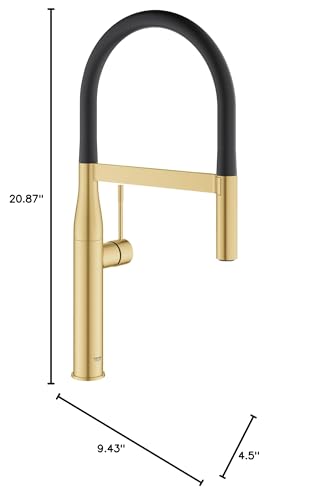 Grohe Essence single-handle kitchen faucet with tall arched spout, black handle, and brushed gold finish.