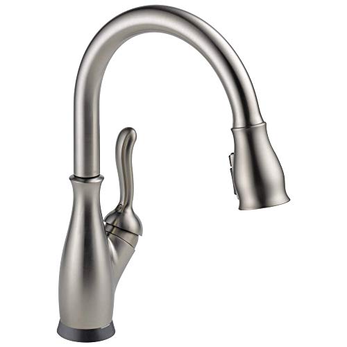 Stainless steel single-handle pull-down kitchen faucet with curved spout and black base ring.