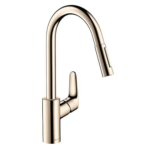 Polished nickel high arc kitchen faucet with pull-down spray head and single lever handle.