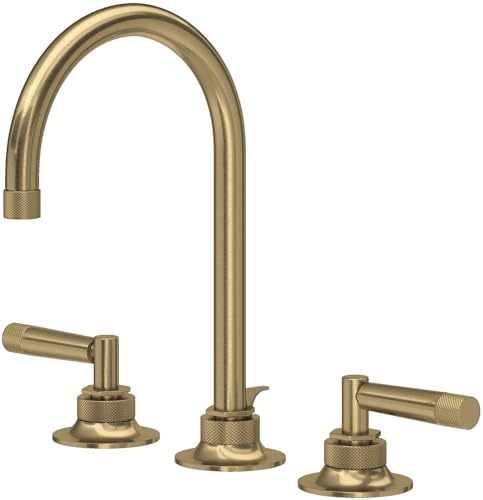 Antique gold widespread lavatory faucet with curved C-spout and lever handles on circular base.