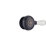 Venetian bronze tub and shower handle with white porcelain grip and circular trim ring.