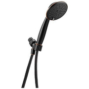 Oil rubbed bronze hand shower with adjustable bracket and flexible hose attached.
